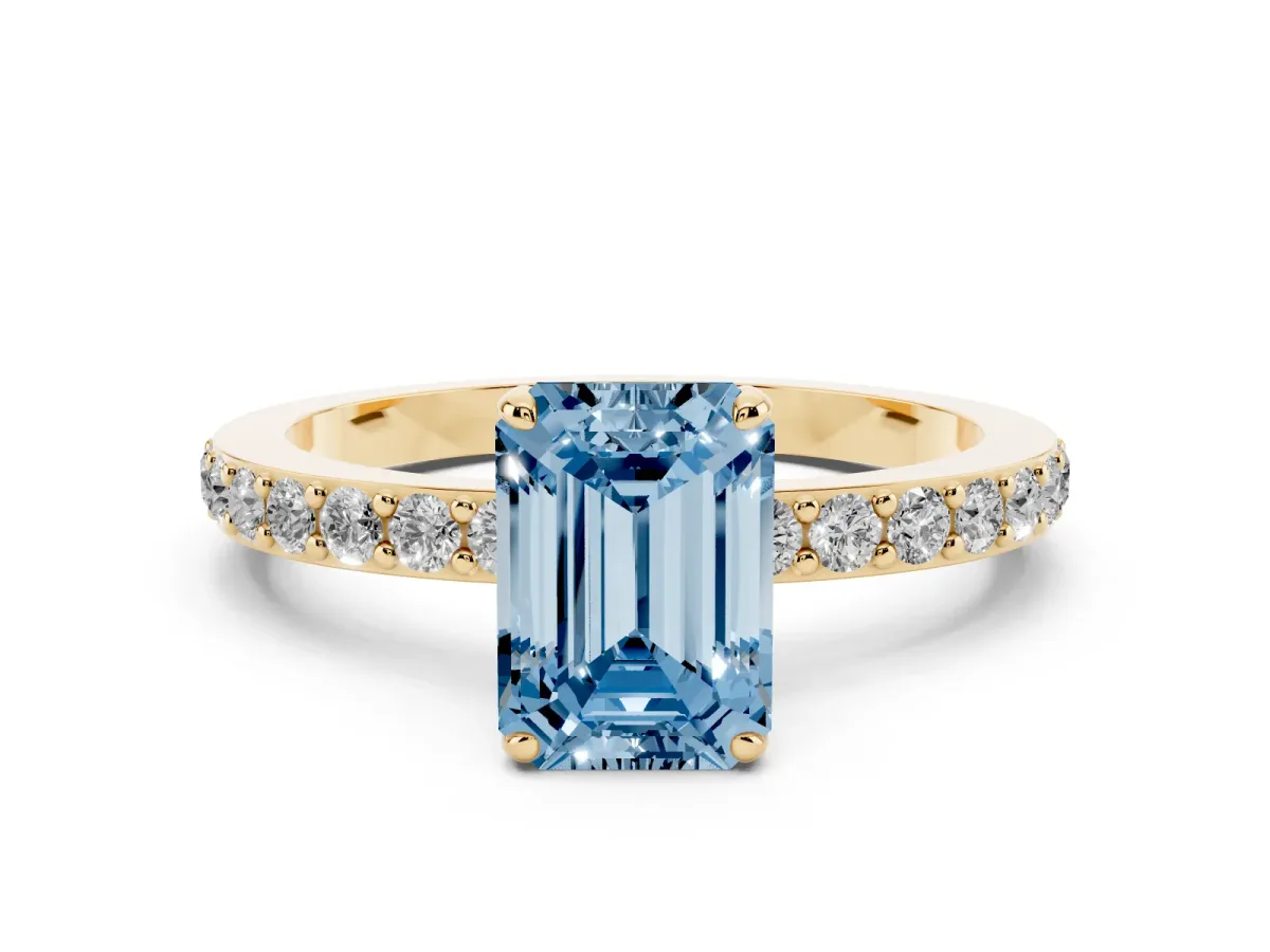 Fancy Blue Emerald Cut Diamond Solitaire Engagement Ring with Pavé Band and Four-Prong Setting Yellow gold