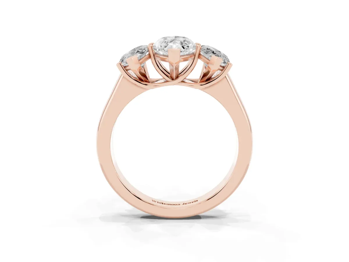 Marquise Cut Three-Stone Diamond Ring with Prong Setting on a Classic Band Rose gold