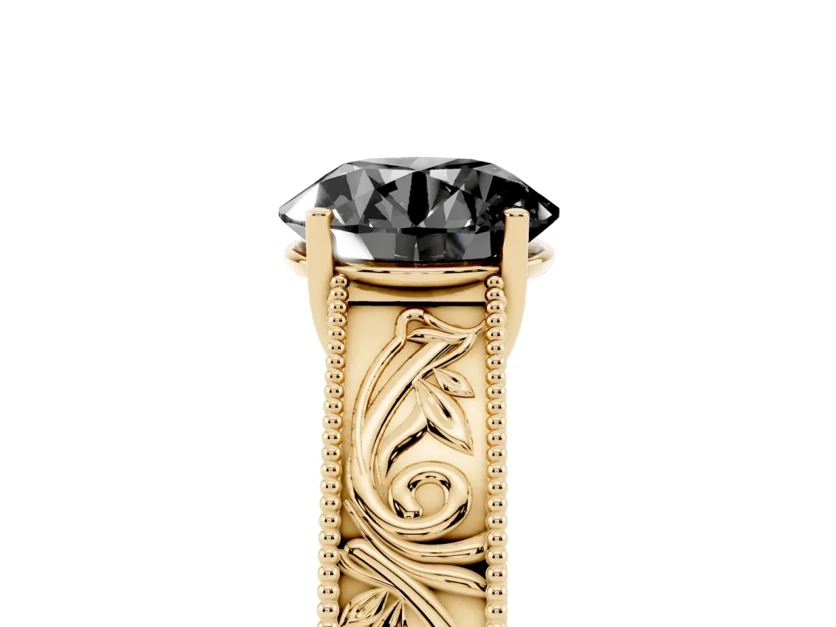 Fancy Black Round Cut Diamond Solitaire Ring with Engraved Band and Four-Prong Setting Yellow gold