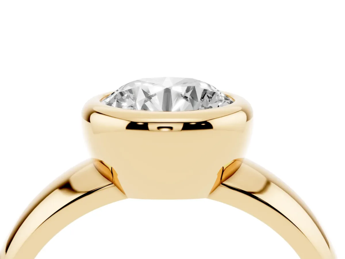 Bezel Set Round Cut Solitaire Ring with Wide Band Yellow gold