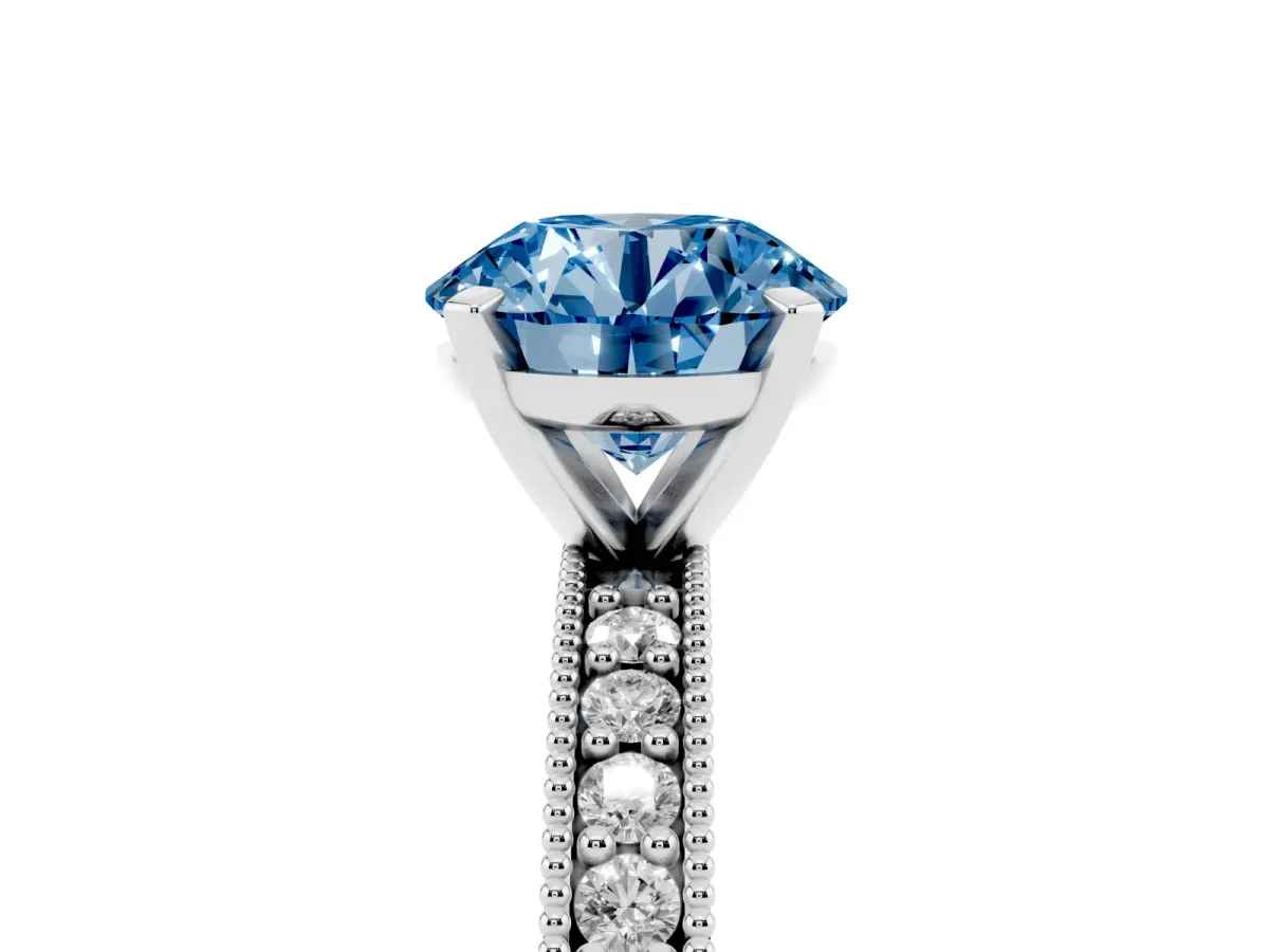 Fancy Blue Round Cut Diamond Milgrain Pavé Engagement Ring with Four-Prong Setting Silver