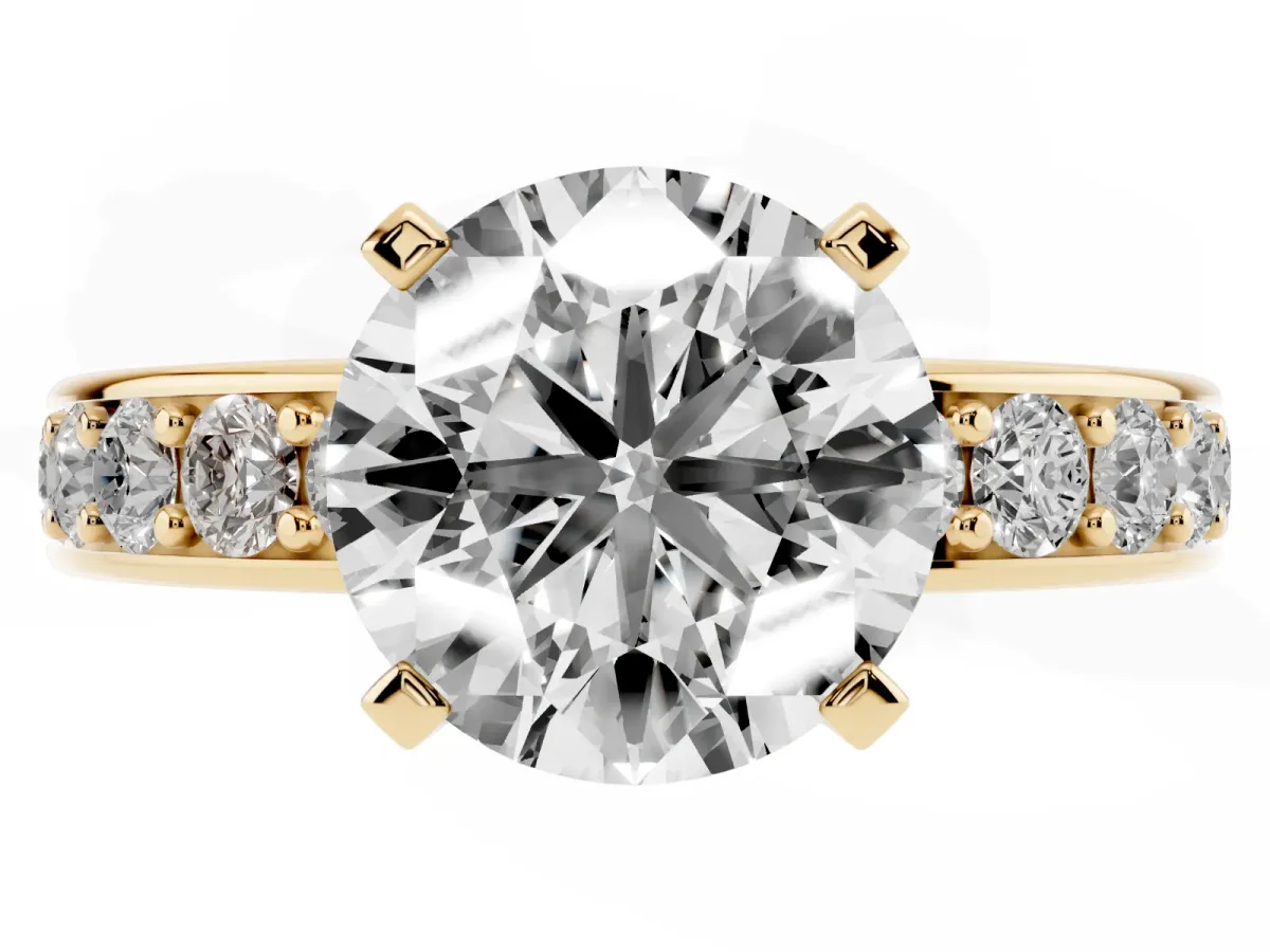 Round Cut Diamond Engagement Ring with Channel Set Round Band and Prong Setting Yellow gold