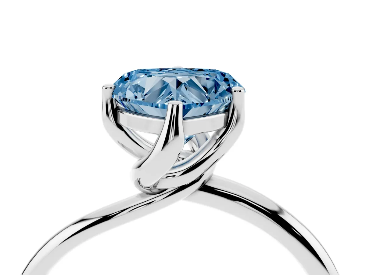 Fancy Blue Heart Cut Diamond Solitaire Engagement Ring with Four-Prong Setting and Classic Band Silver