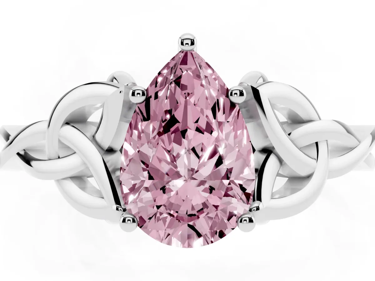 Fancy Pink Pear Cut Diamond Solitaire Engagement Ring with Celtic Knot Band and Four-Prong Setting Silver