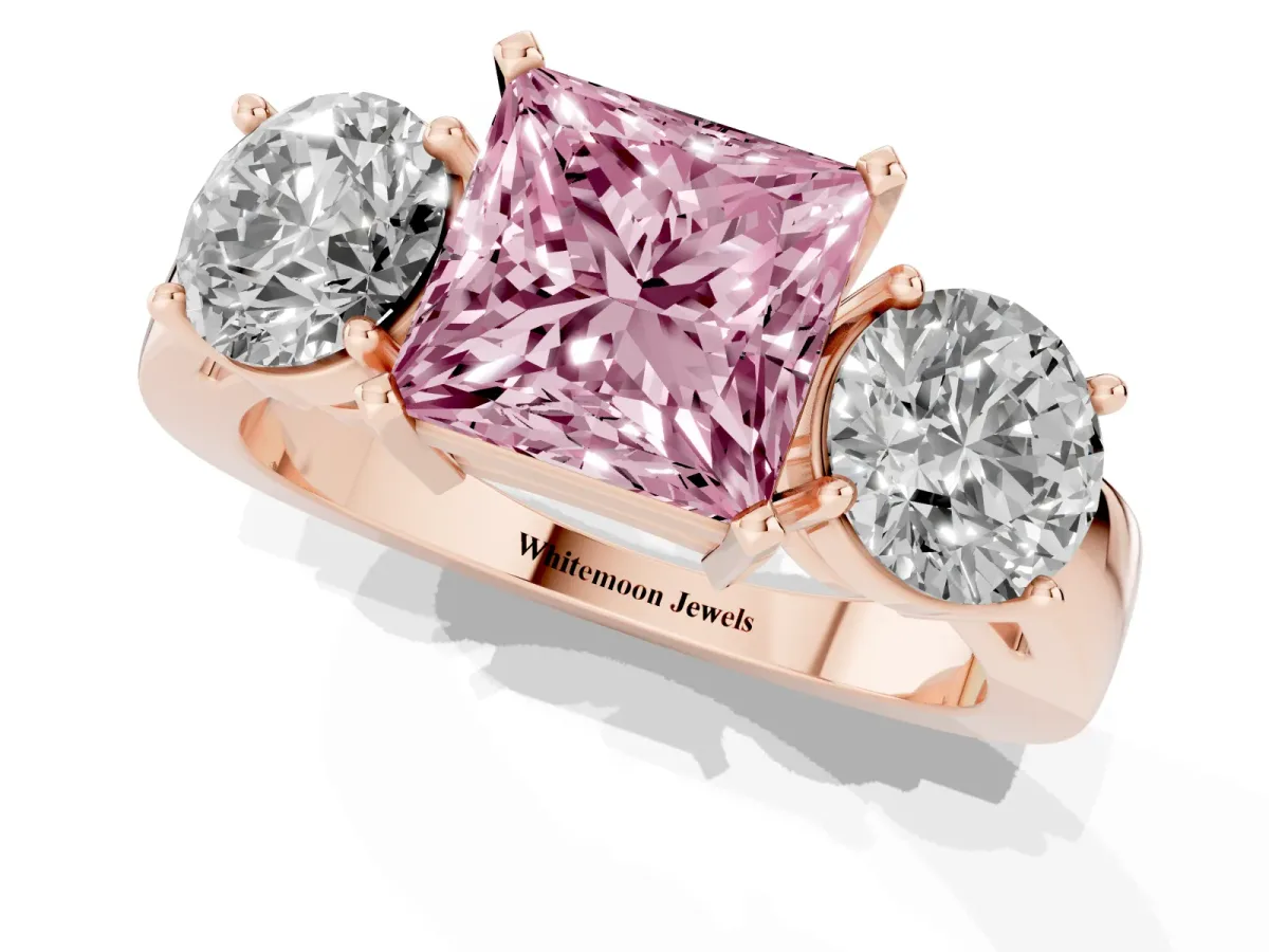 Fancy Pink Three-Stone Princess Cut Diamond Ring with Round Side Stones, Classic Band, and Four-Prong Setting Rose gold
