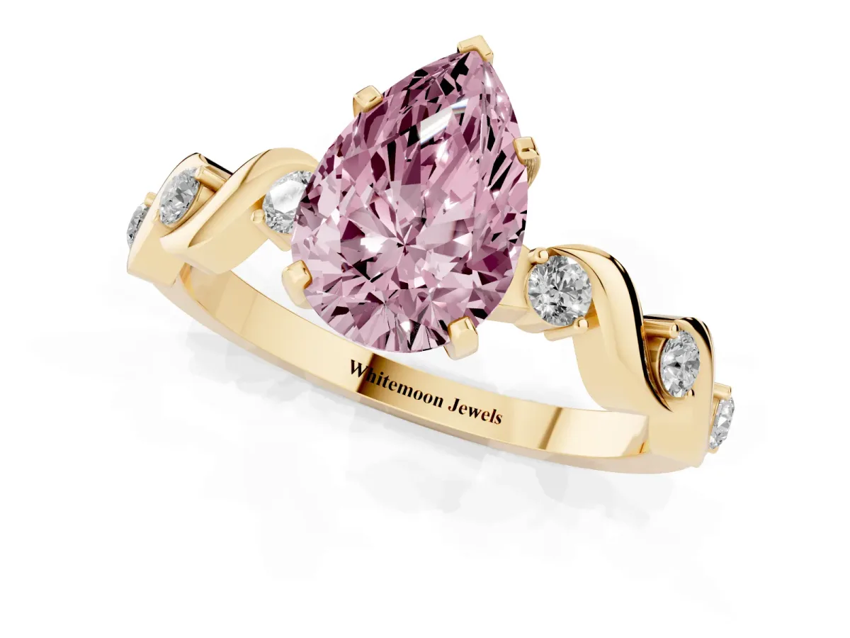 Fancy Pink Pear Cut Diamond Solitaire Twisted Band with Round Accents and Prong Setting Yellow gold