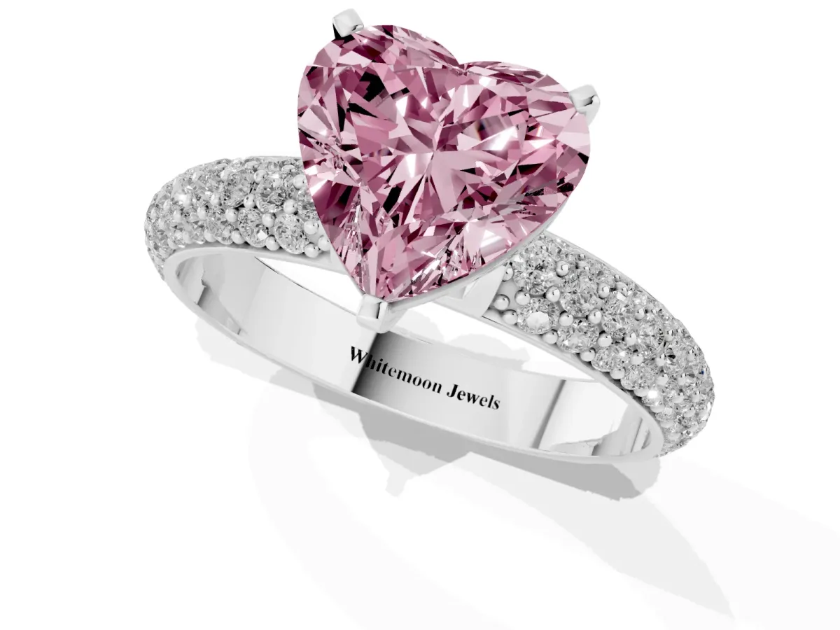 Fancy Pink Heart Cut Diamond Solitaire Ring with Prong Setting and Pavé Band Silver
