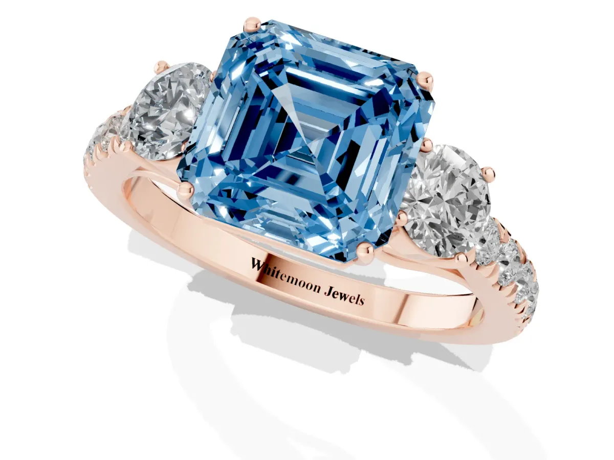 Fancy Blue Asscher Cut Cut Diamond Three-Stone Ring with Round Side Stones and Pavé Band Rose gold