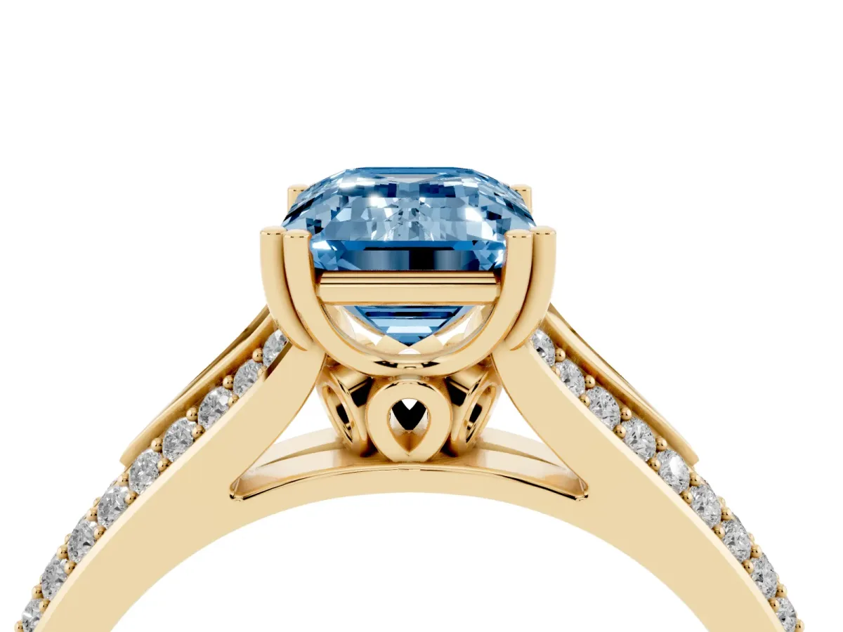 Fancy Blue Emerald Cut Diamond Split Shank Engagement Ring with Pavé Band Yellow gold
