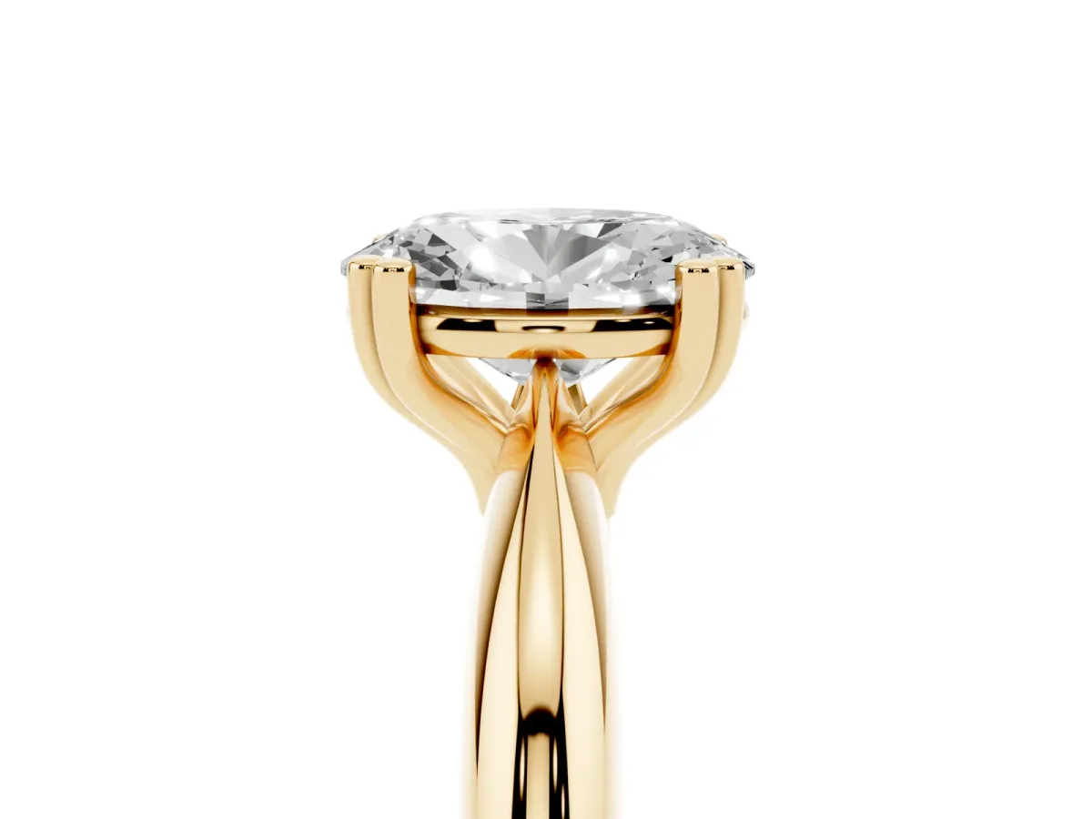 Oval Cut Cut Solitaire Engagement Ring with Tapered Band and Four-Prong Setting Yellow gold