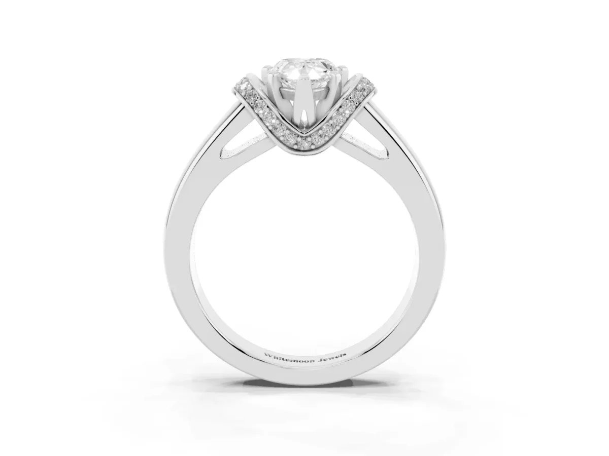 Pear Cut Solitaire Diamond Ring with Pave Band and Six-Prong Setting Silver