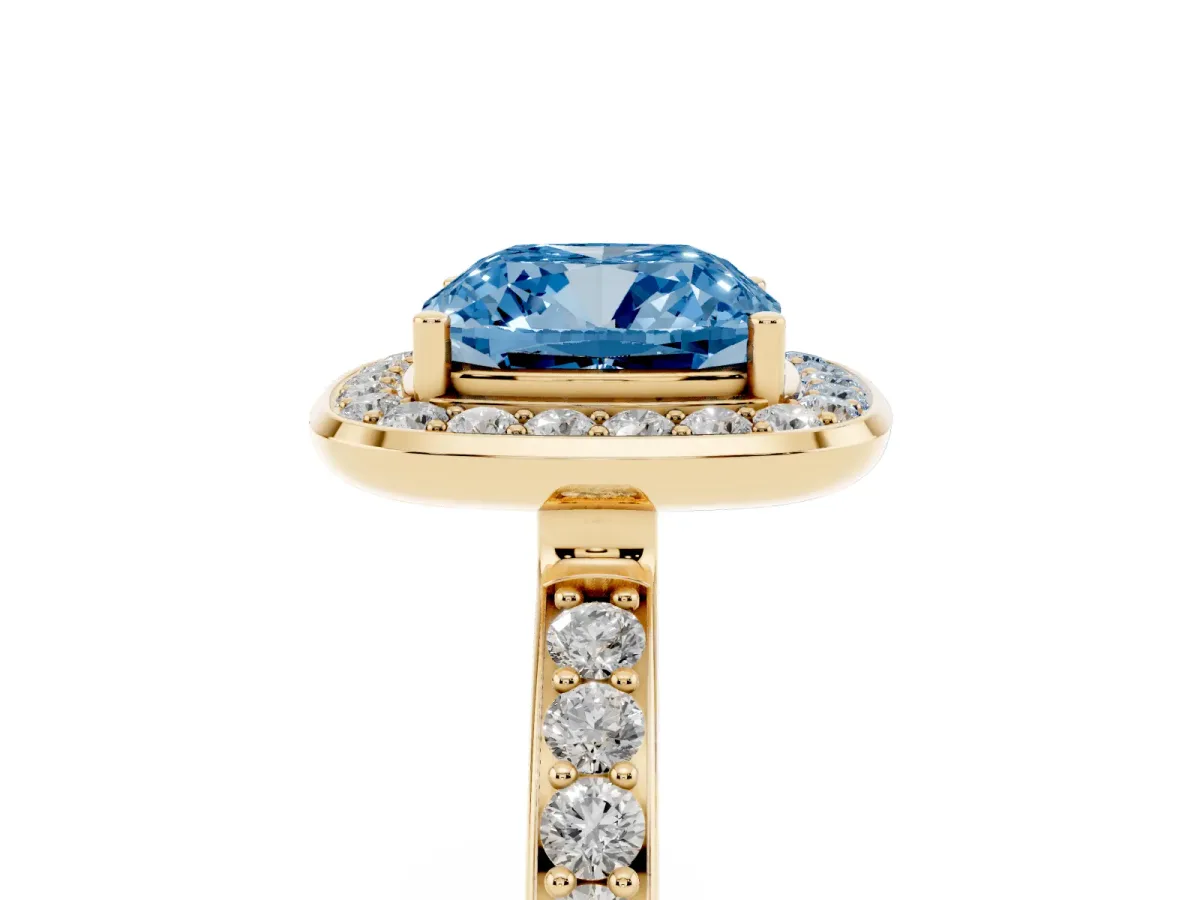 Fancy Blue Cushion Cut Diamond Halo Ring with Bezel Frame and Pavé Band Yellow gold