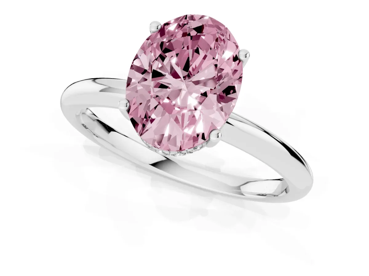Fancy Pink Oval Cut Cut Solitaire Engagement Ring with Four-Prong Setting and Classic Band Silver