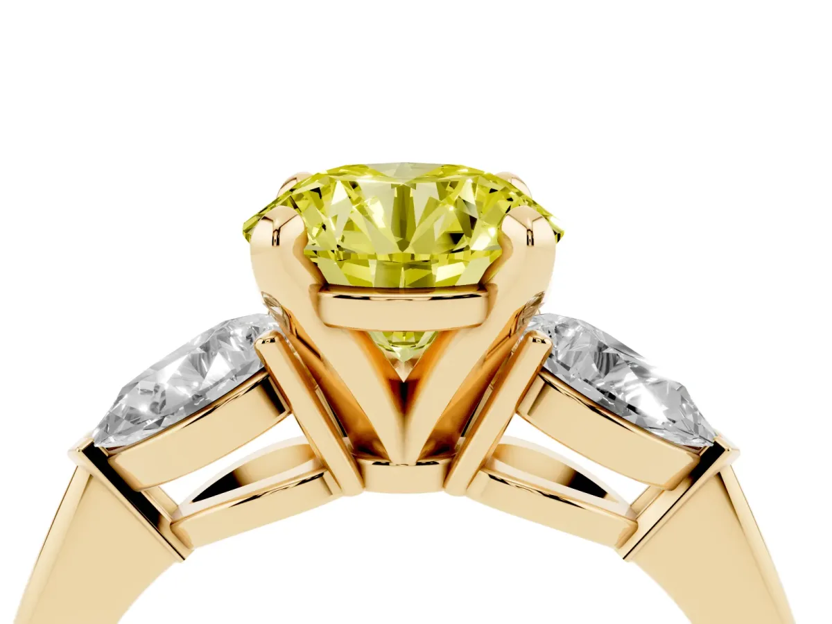 Fancy Yellow Three-Stone Round Cut Diamond Ring with Pear Side Stones and Four-Prong Setting Yellow gold