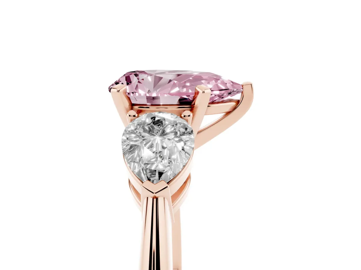 Fancy Pink Three-Stone Pear Cut Diamond Ring with Pear Side Stones and Four-Prong Setting Rose gold