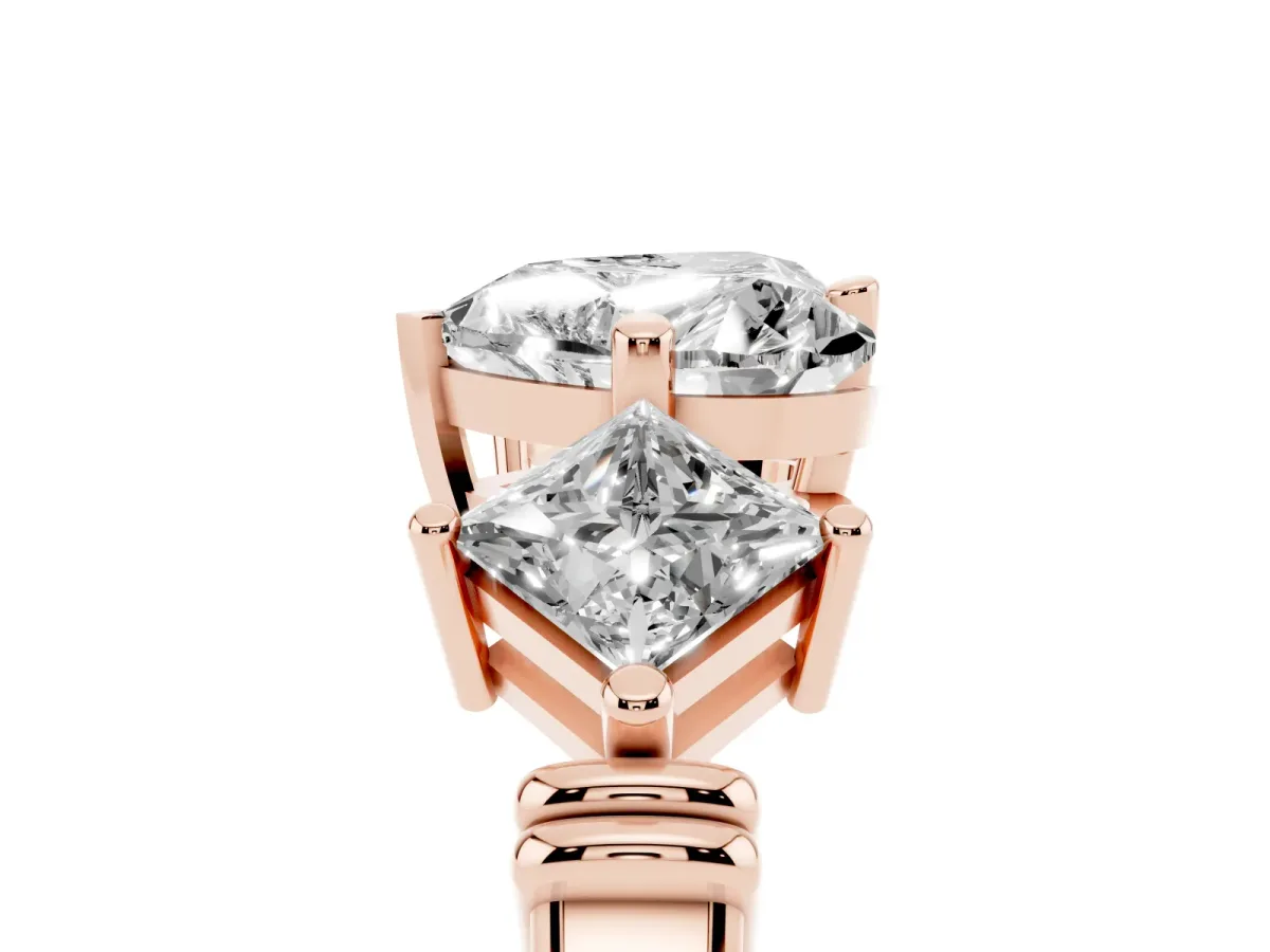 Three-Stone Heart Cut and Princess Cut Diamond Ring with Channel Band and Four-Prong Setting Rose gold