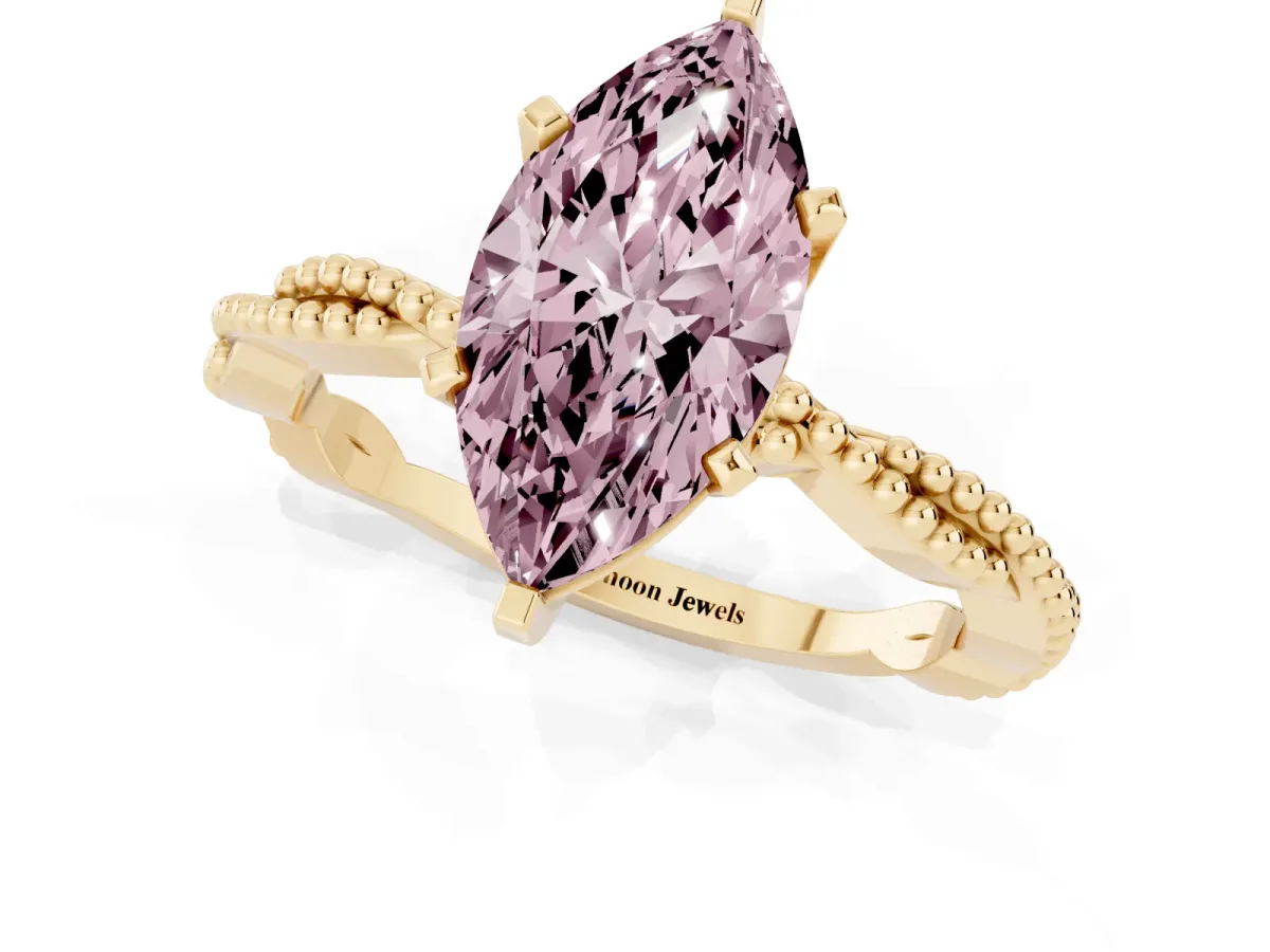 Fancy Pink Marquise Cut Solitaire Twisted Band with Bead Prong Setting Yellow gold