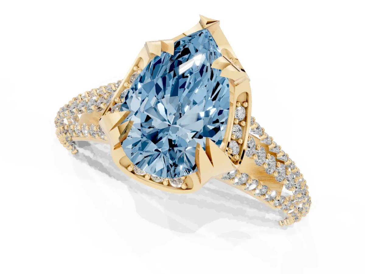 Fancy Blue Pear Cut Solitaire Pave Split Shank Ring with Four-Prong Setting Yellow gold