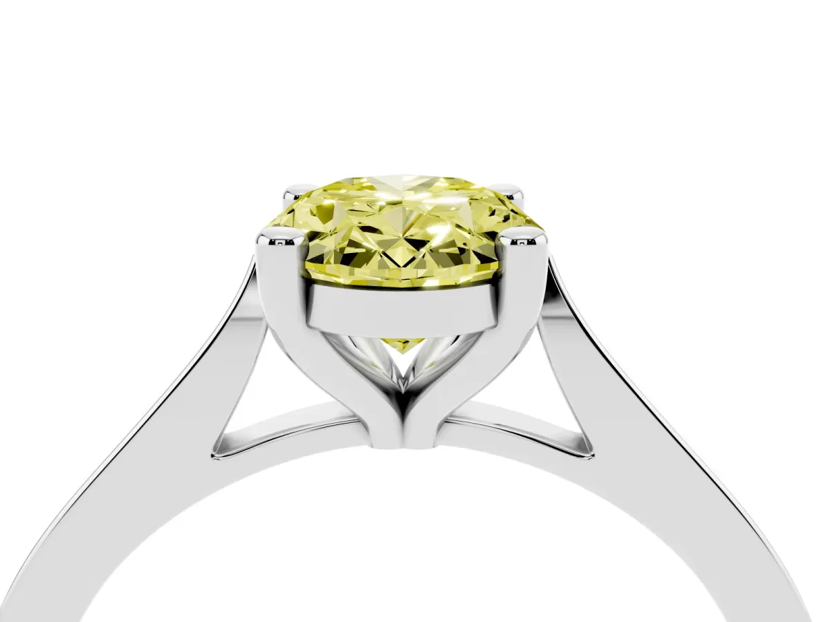 Fancy Yellow Oval Cut Solitaire Diamond Ring with Four-Prong Setting and Tapered Band Silver