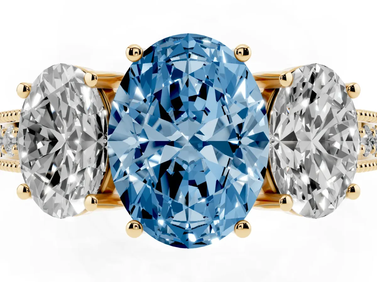 Fancy Blue Three-Stone Oval Cut Cut Milgrain Pavé Engagement Ring Yellow gold