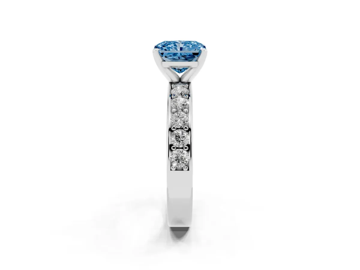 Fancy Blue Radiant Cut Diamond Engagement Ring with Channel Set Round Band and Prong Setting Silver
