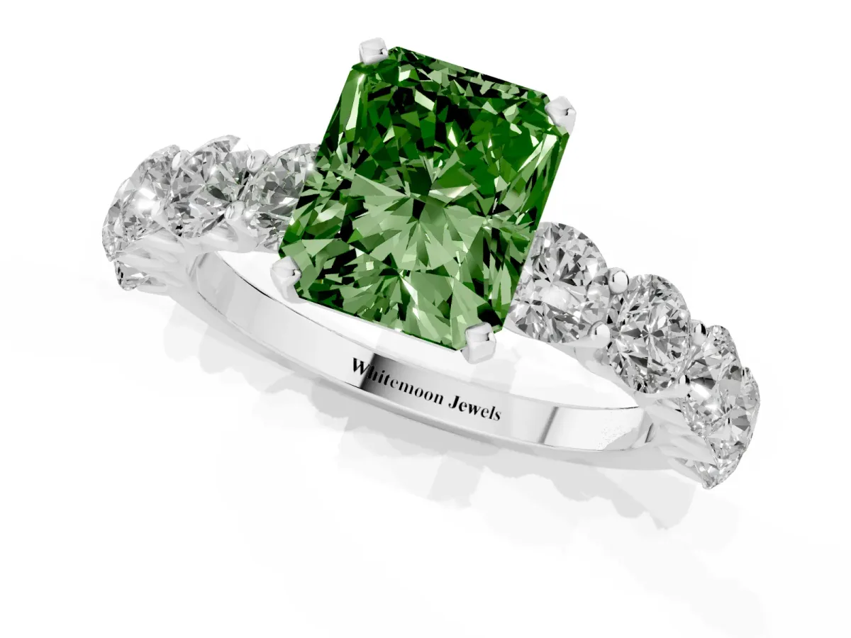 Fancy Green Radiant Cut Diamond Prong Setting with Side Stones on a Pave Band Platinum