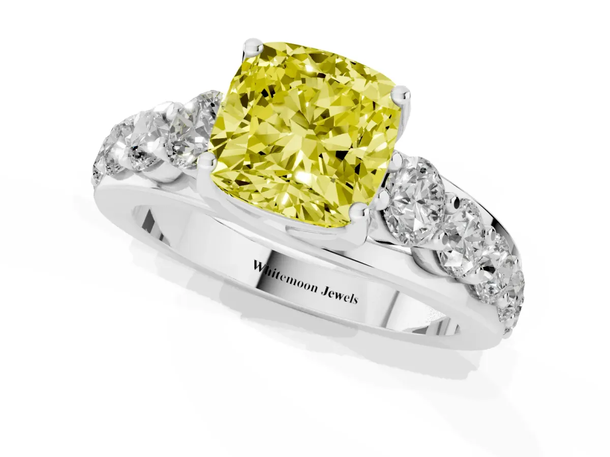 Fancy Yellow Cushion Cut Diamond Engagement Ring with Pavé Band and Four-Prong Setting Platinum