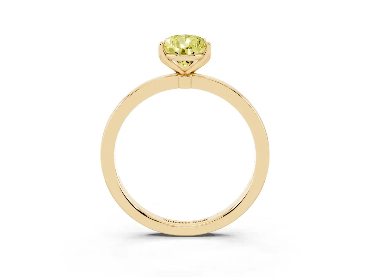 Fancy Yellow Pear Cut Diamond Solitaire Ring with Thin Band and Prong Setting Yellow gold