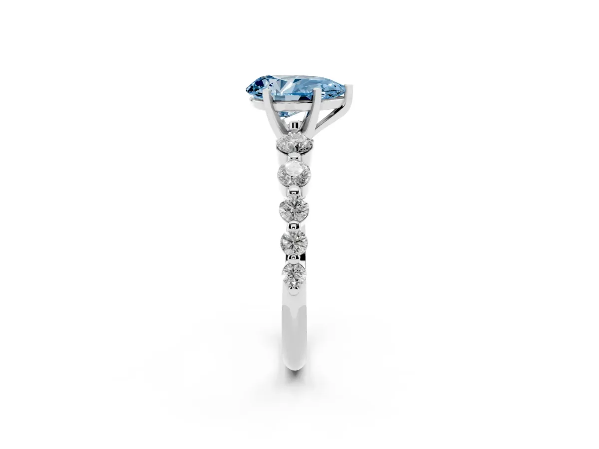 Fancy Blue Pear Cut Solitaire Diamond Ring with Pave Band and Four-Prong Setting Silver