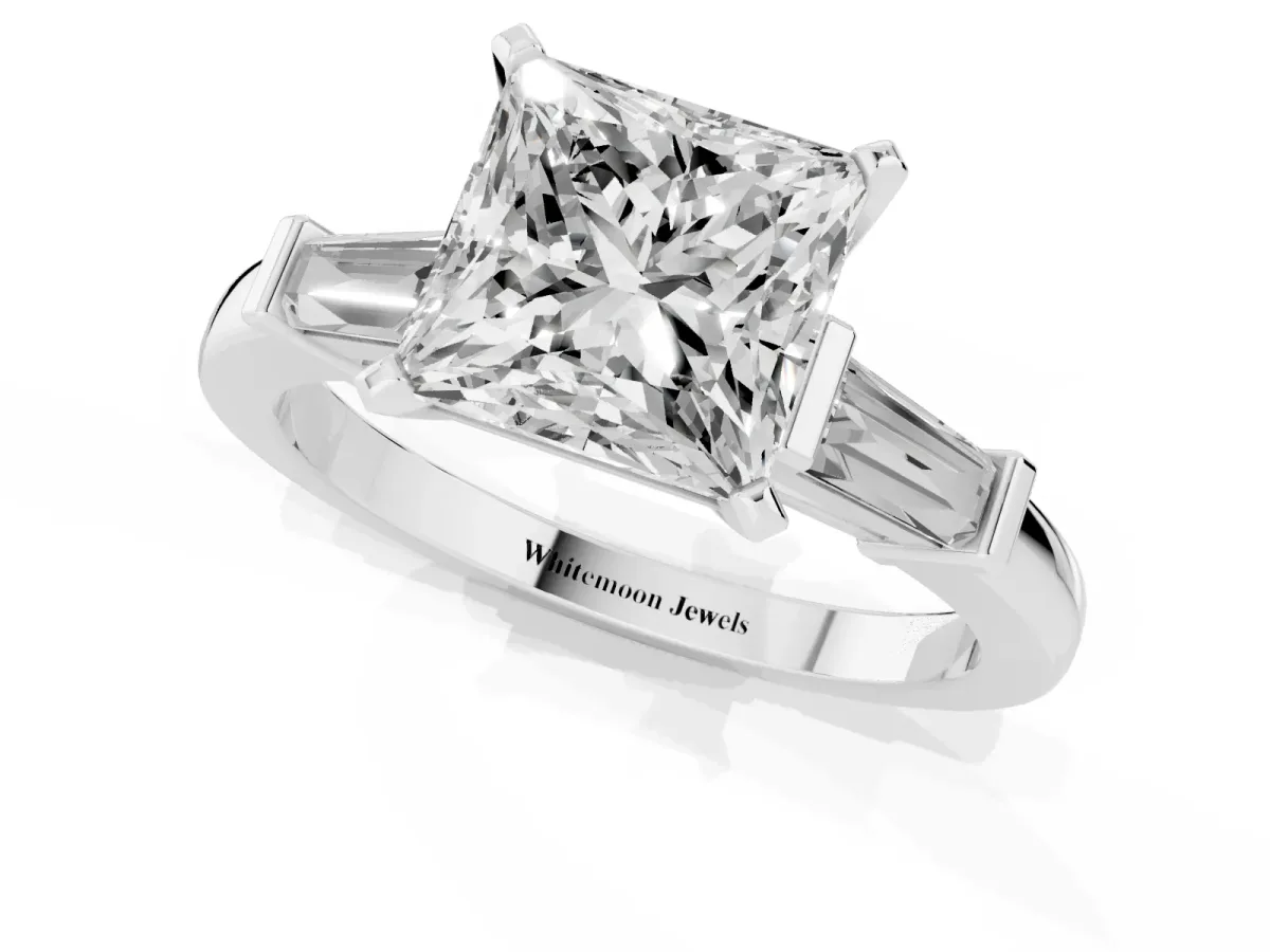 Princess Cut Cut Diamond Solitaire Ring with Tapered Baguette Accents and Four-Prong Setting Silver