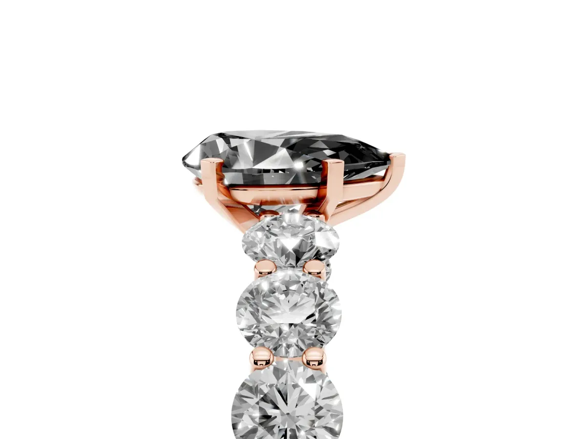 Fancy Black Pear Cut Diamond Prong Setting with Side Stones on a Pave Band Rose gold