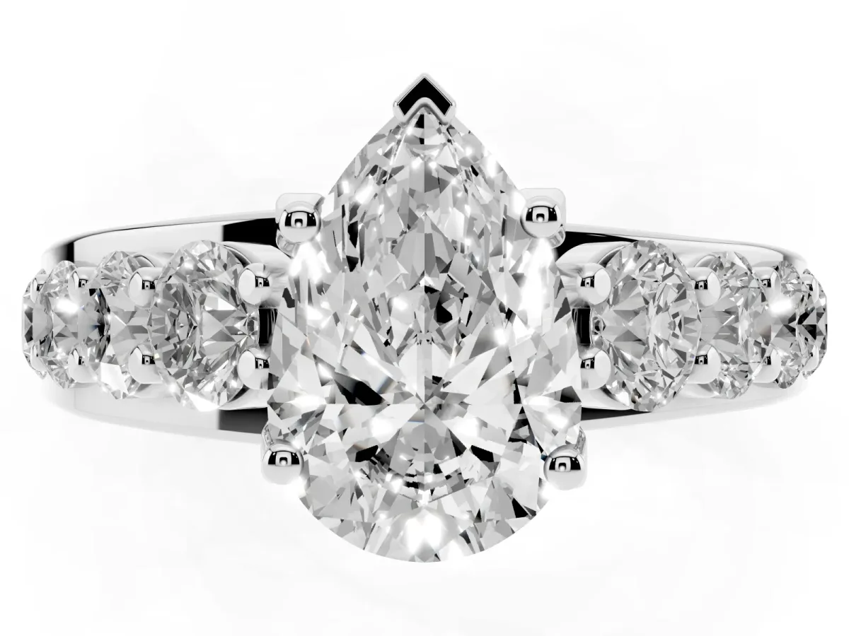 Pear Cut Diamond Engagement Ring with Pavé Band and Four-Prong Setting Platinum