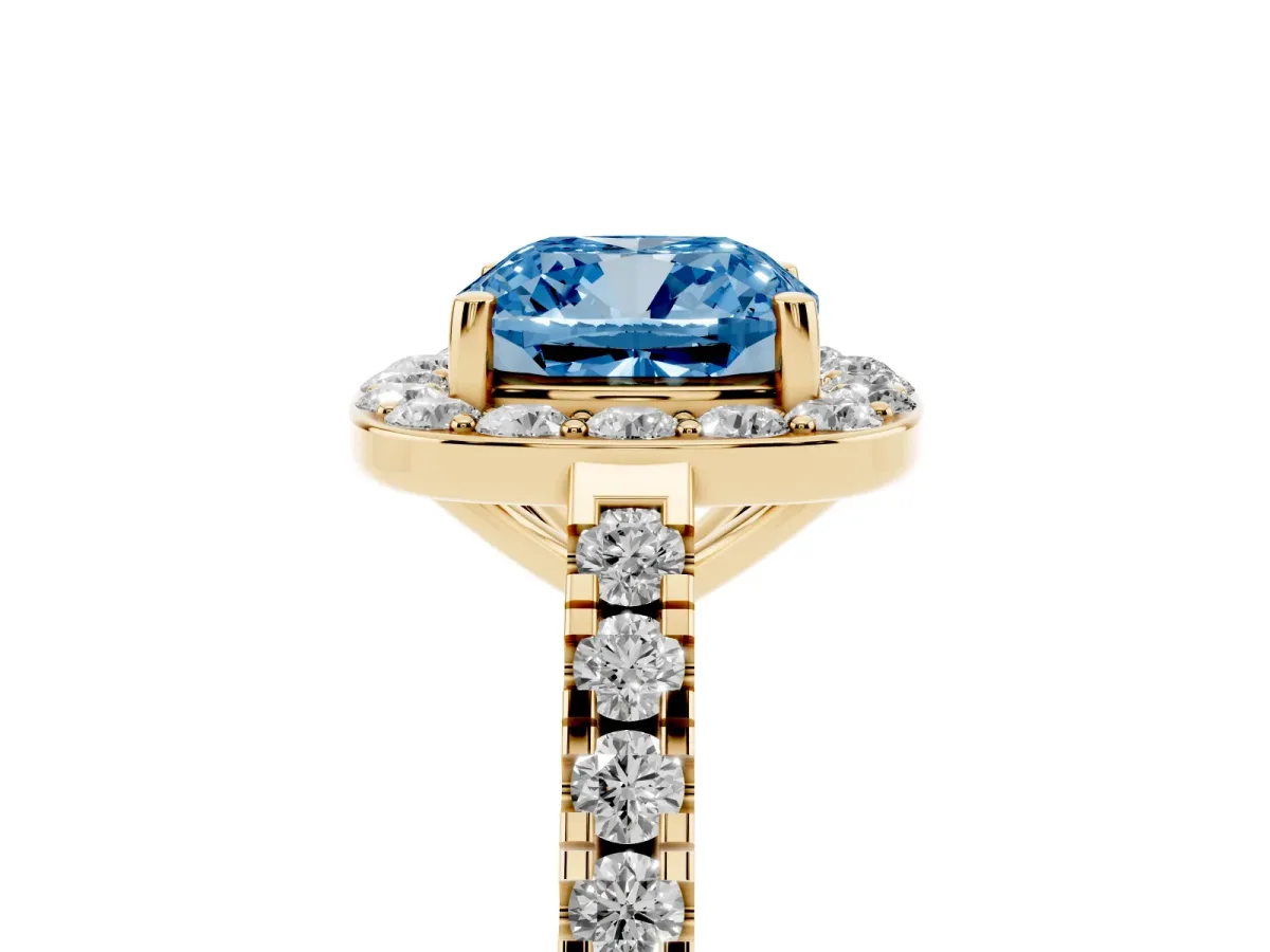 Fancy Blue Cushion Cut Diamond Halo Ring with Round Pavé Split Shank and Prong Setting Yellow gold