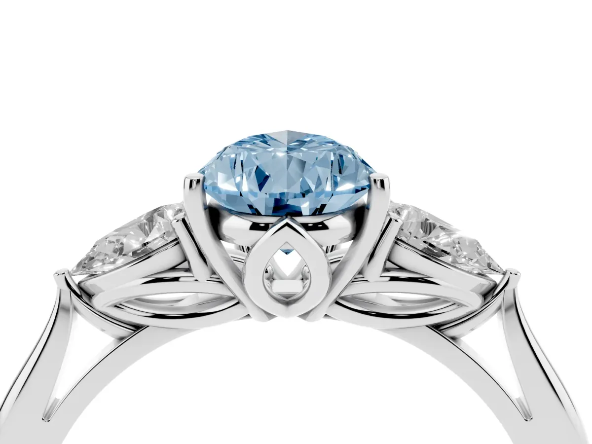 Fancy Blue Pear Cut Diamond Three-Stone Ring with Pear Side Stones and Prong Setting Platinum