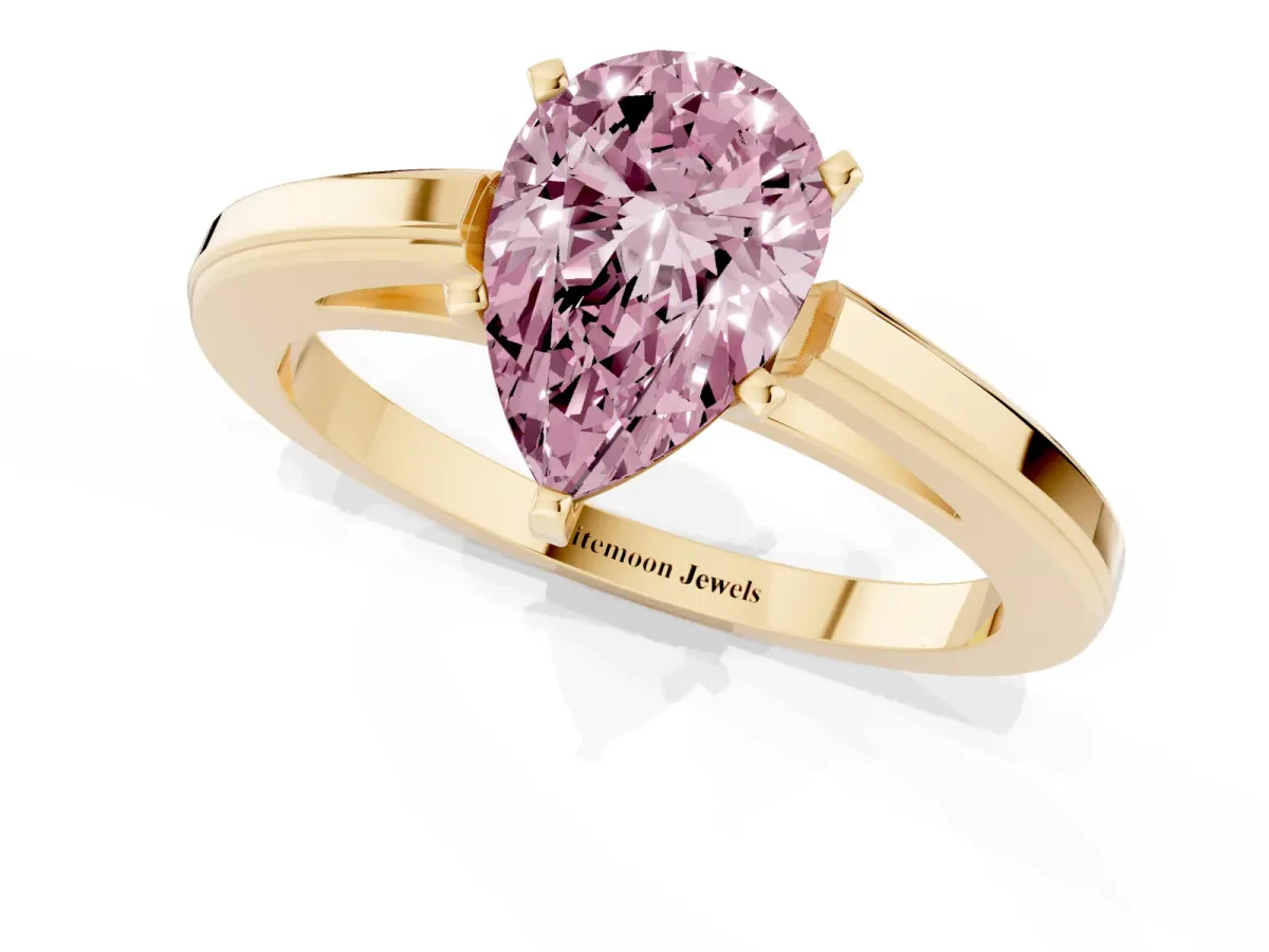 Fancy Pink Pear Cut Solitaire Diamond Ring with Four-Prong Setting and Classic Band Yellow gold