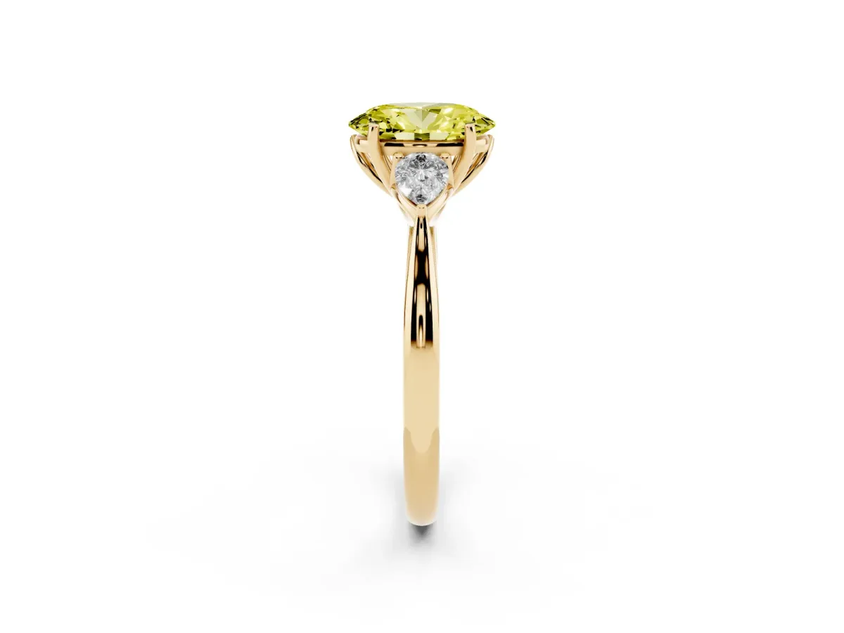Fancy Yellow Oval Cut Diamond Three-Stone Ring with Pear Side Stones and Prong Setting Yellow gold
