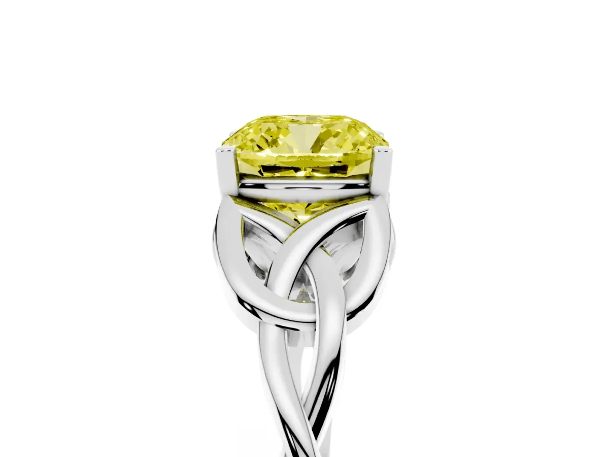 Fancy Yellow Cushion Cut Diamond Solitaire Engagement Ring with Celtic Knot Band and Four-Prong Setting Silver