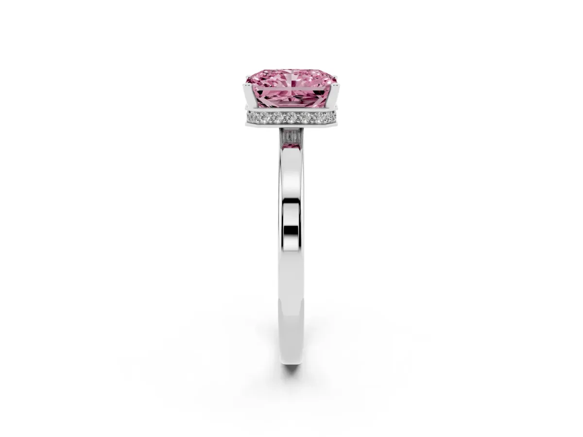Fancy Pink Radiant Cut Cut Solitaire Engagement Ring with Four-Prong Setting on a Classic Band Silver