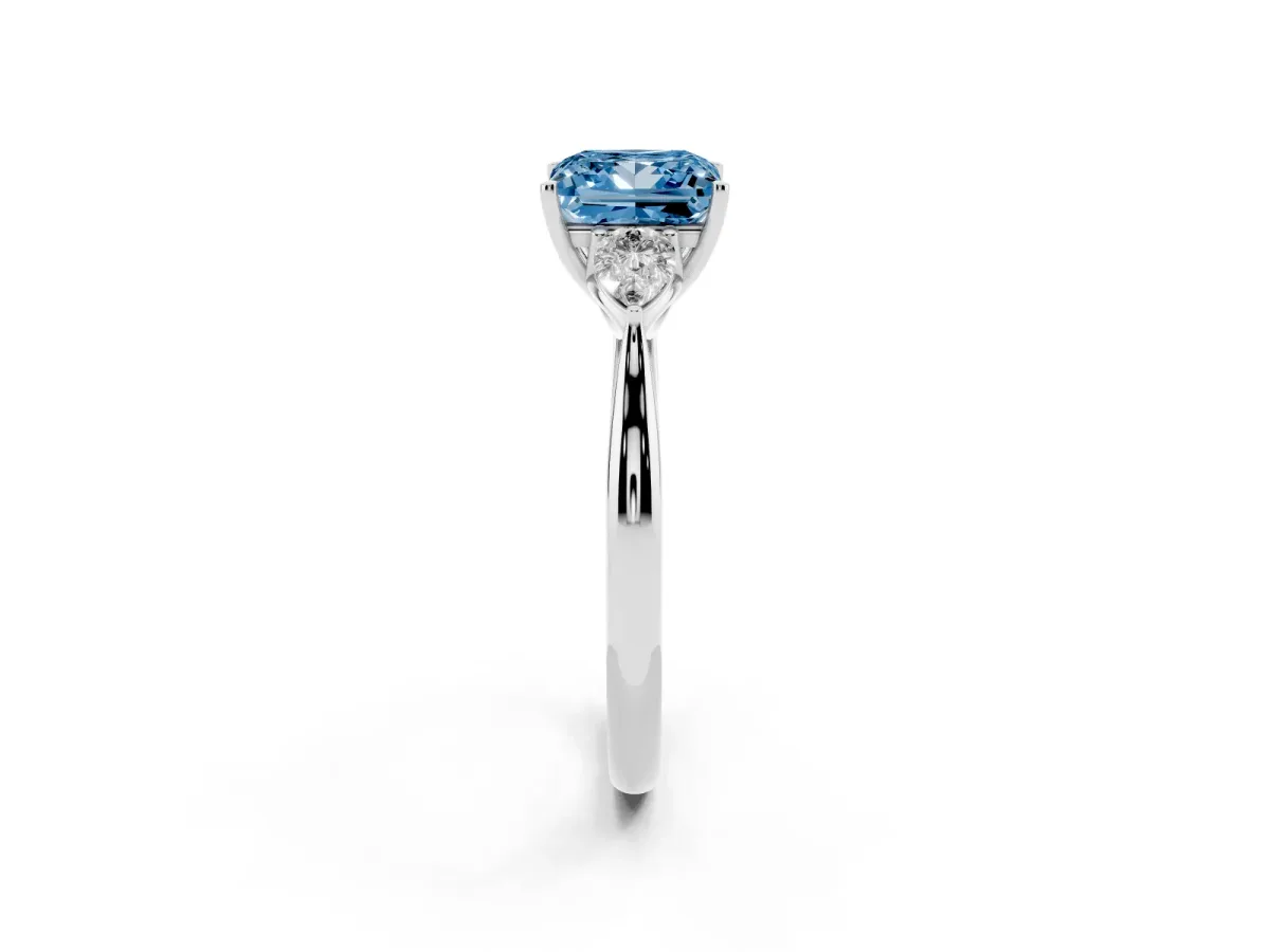 Fancy Blue Three-Stone Princess Cut Brilliant Diamond Solitaire Ring with Tapered Band and Four-Prong Setting White gold