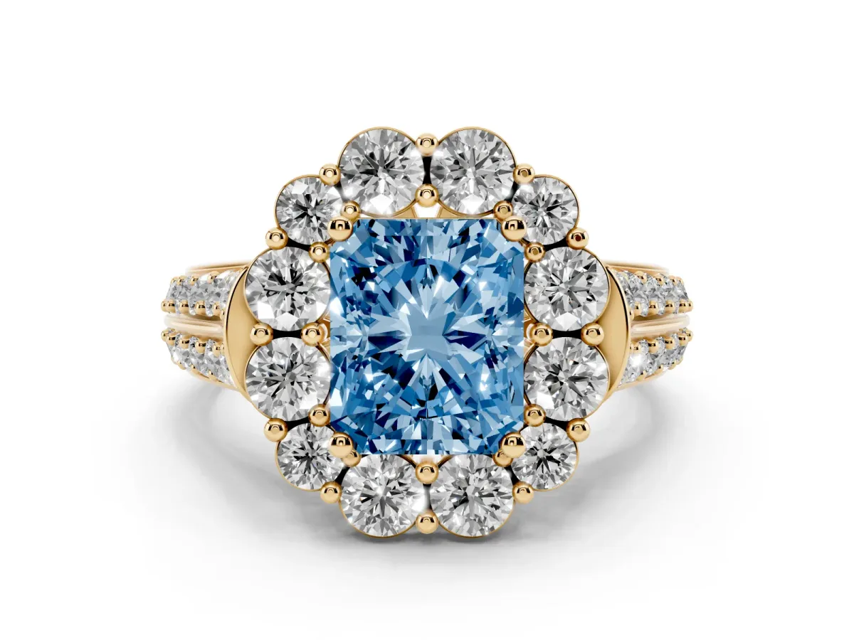 Fancy Blue Radiant Cut Halo Diamond Engagement Ring with Split Shank and Prong Setting Yellow gold