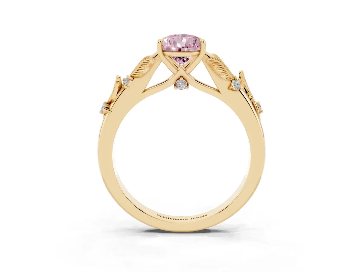 Fancy Pink Pear Cut Diamond Solitaire Ring with Leaf Motif Band and Four-Prong Setting Yellow gold