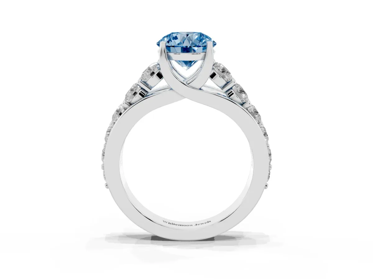 Fancy Blue Round Cut Diamond Engagement Ring with Pavé Band and Four-Prong Setting Silver