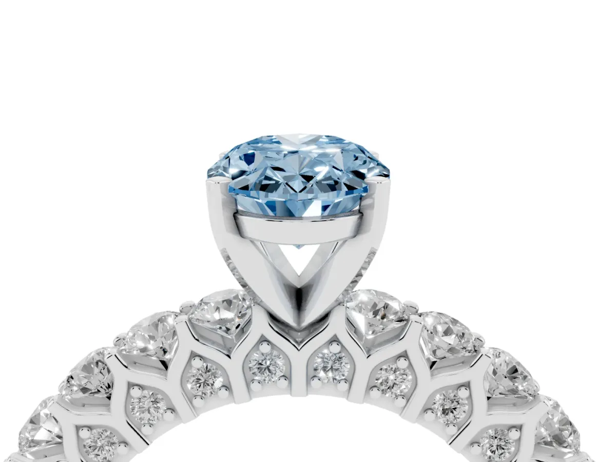 Fancy Blue Oval Cut Diamond Solitaire Ring with Shared Prong Pavé Band and Four-Prong Setting Silver