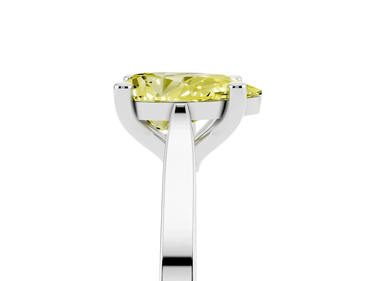 Fancy Yellow Pear Cut Solitaire Diamond Ring with Four-Prong Setting and Tapered Band White gold