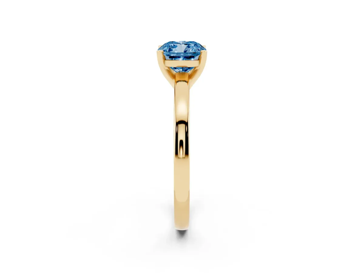 Fancy Blue Cushion Cut Solitaire Diamond Engagement Ring with Four-Prong Setting on a Classic Band Yellow gold