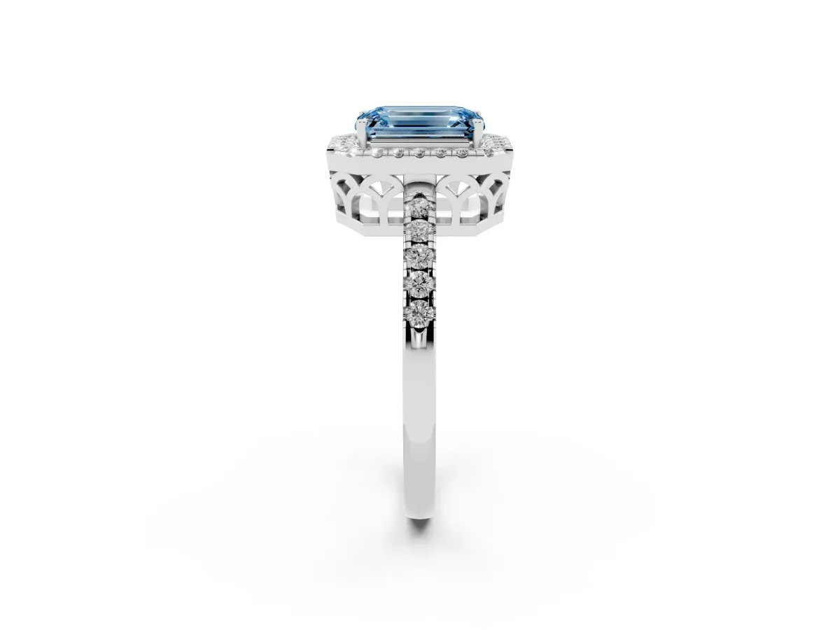 Fancy Blue Emerald Cut Halo Diamond Engagement Ring with Pavé Band and Four-Prong Setting White gold
