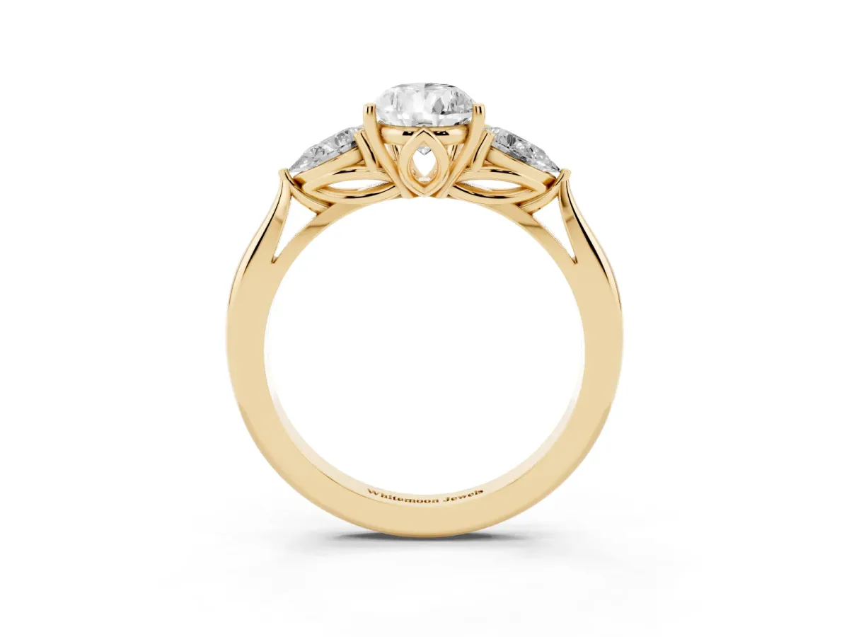 Pear Cut Diamond Three-Stone Ring with Pear Side Stones and Prong Setting Yellow gold