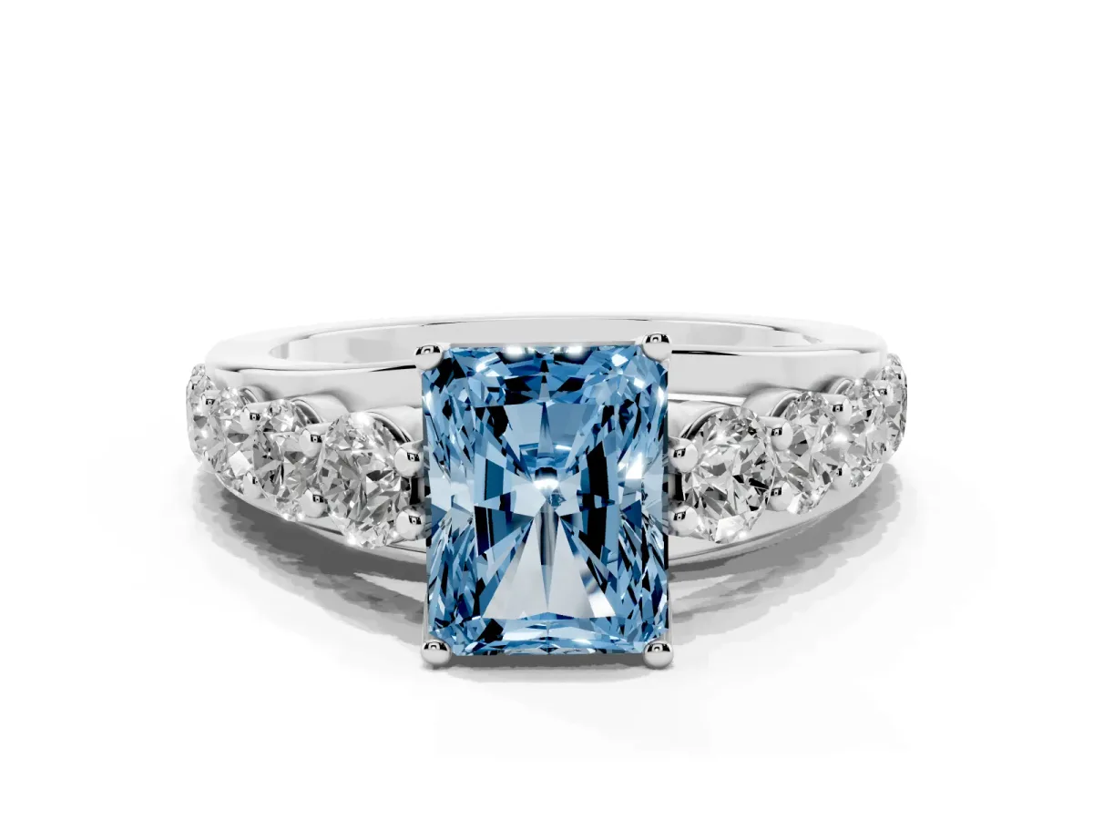 Fancy Blue Radiant Cut Diamond Engagement Ring with Pavé Band and Four-Prong Setting Silver