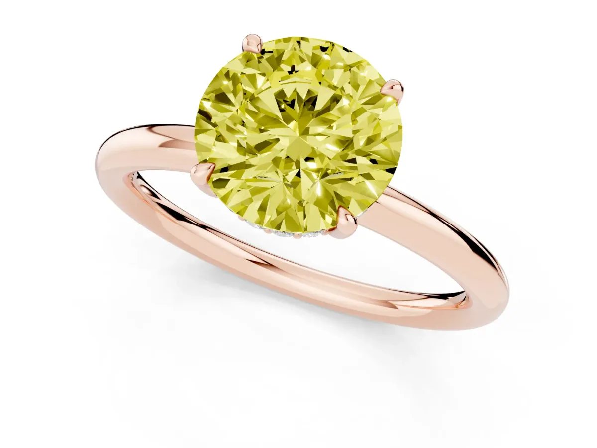 Fancy Yellow Round Cut Diamond Solitaire Ring with Thin Band and Four-Prong Setting Rose gold