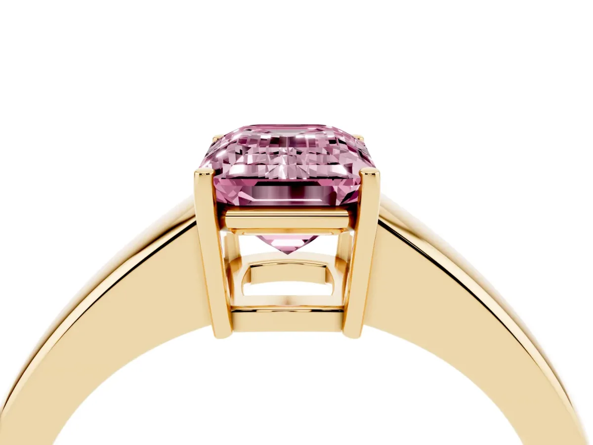 Fancy Pink Emerald Cut Solitaire Diamond Ring with Tapered Band and Four-Prong Setting Yellow gold